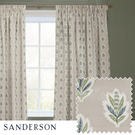 Pencil pleat curtains in flax-beige with a repeating Sessile Leaf motif in green and slate blue, shown pencil-pleat headed on a wooden pole beside a window, with a fabric swatch inset.
