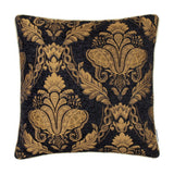 Shiraz Jacquard Chenille Cushion in black, square shape with a woven gold floral damask pattern and cream cord trim, shown on a white background.