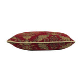 Side view of the Shiraz Jacquard Chenille Cushion in burgundy, showing a woven damask floral pattern in gold and olive with a gold cord trim, on a white background.