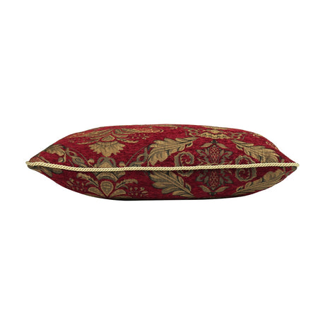 Side view of the Shiraz Jacquard Chenille Cushion in burgundy, showing a woven damask floral pattern in gold and olive with a gold cord trim, on a white background.