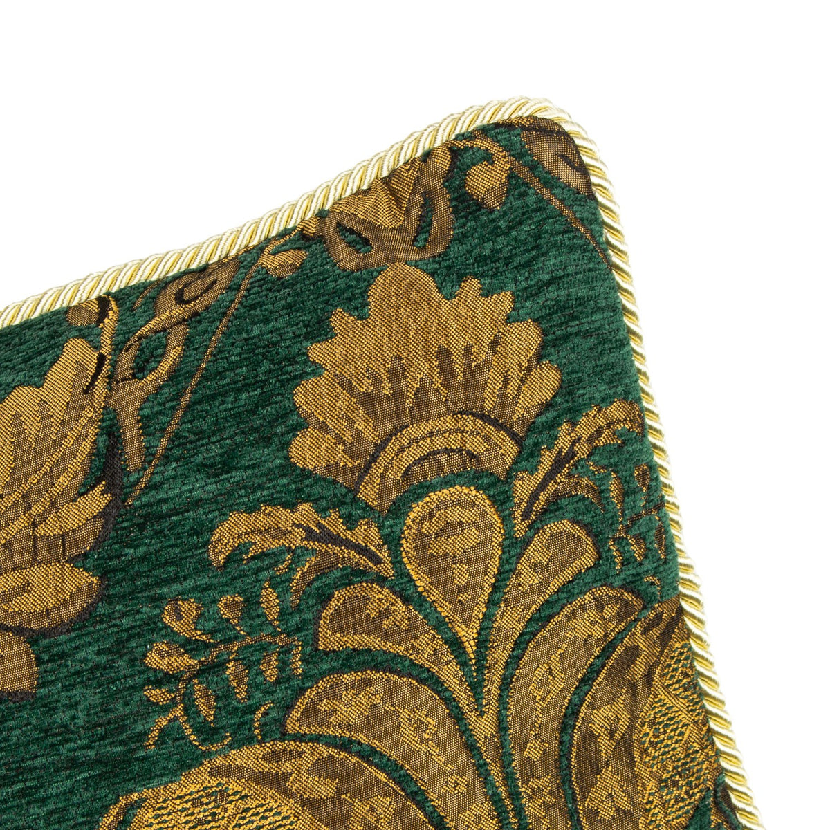 Close-up of the Shiraz Jacquard Chenille Cushion in emerald, showing a gold floral damask weave with a twisted cord edge trim, against a white background.
