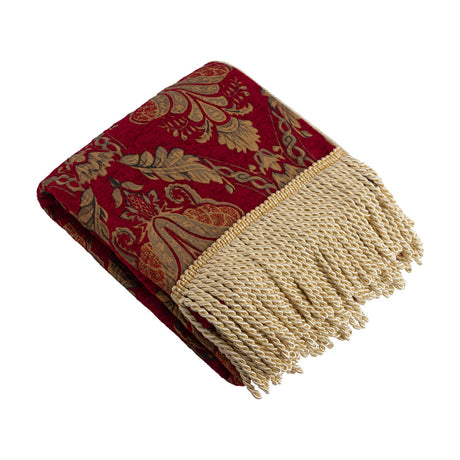 Shiraz Jacquard Chenille Throw in burgundy, folded to show a gold floral damask pattern and twisted gold fringe trim, on a plain white background.