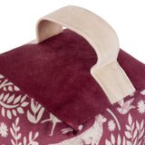 Close-up of the Skandi Woodland Animal Velvet Door Stop in berry, showing a cream carry handle and plain velvet top panel above the printed woodland scene.