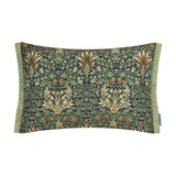 Rectangular lumbar cushion with Snakeshead floral print in indigo, leaf green, cream and gold, finished with plain sage green side panels, shown on a white background.