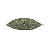 Side view of the Snakeshead Floral polyester lumbar cushion in indigo and leaf green, showing corner tabs and an allover botanical print, on a white background.