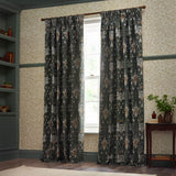 Pencil pleat curtains in Snakeshead jacquard chenille, Indigo/Leaf colourway, hung either side of a window in a traditional study with panelled walls and shelving.