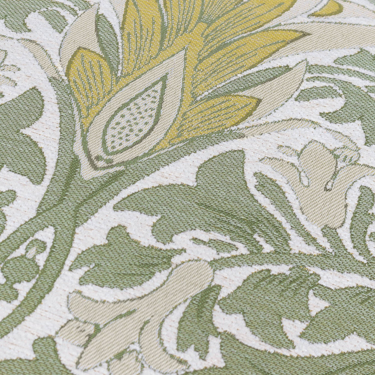Close-up of Snakes Head Jacquard Chenille Cushion fabric, showing sage green foliage and gold flowerheads woven in raised chenille texture on a cream ground.