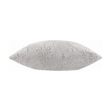 Grey faux fur cushion shown side-on, plumped into a pointed oval shape, with snowflake and star motifs textured into the pile, on a plain white background.