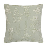 Sophia Eyelet Polyester Cushion in sage, a square 50x50cm design with a woven jacquard botanical pattern of foxgloves, roses and hydrangeas in cream and olive, shown on a plain white background.