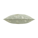 Sophia Eyelet Polyester Cushion in sage, shown side-on with piped edge and a jacquard botanical pattern of foxgloves, roses and hydrangeas in cream and olive, on a white background.
