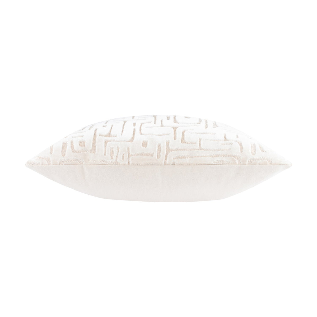 Side view of the Soren Abstract Velvet Cushion in Chalk, showing plain cream velvet piping and base beneath the textured geometric-patterned face, set on a white background.