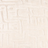 Close-up of the Soren Abstract Velvet Cushion in Chalk, showing cut velvet pile sculpted into a raised geometric maze-like pattern in cream tones.