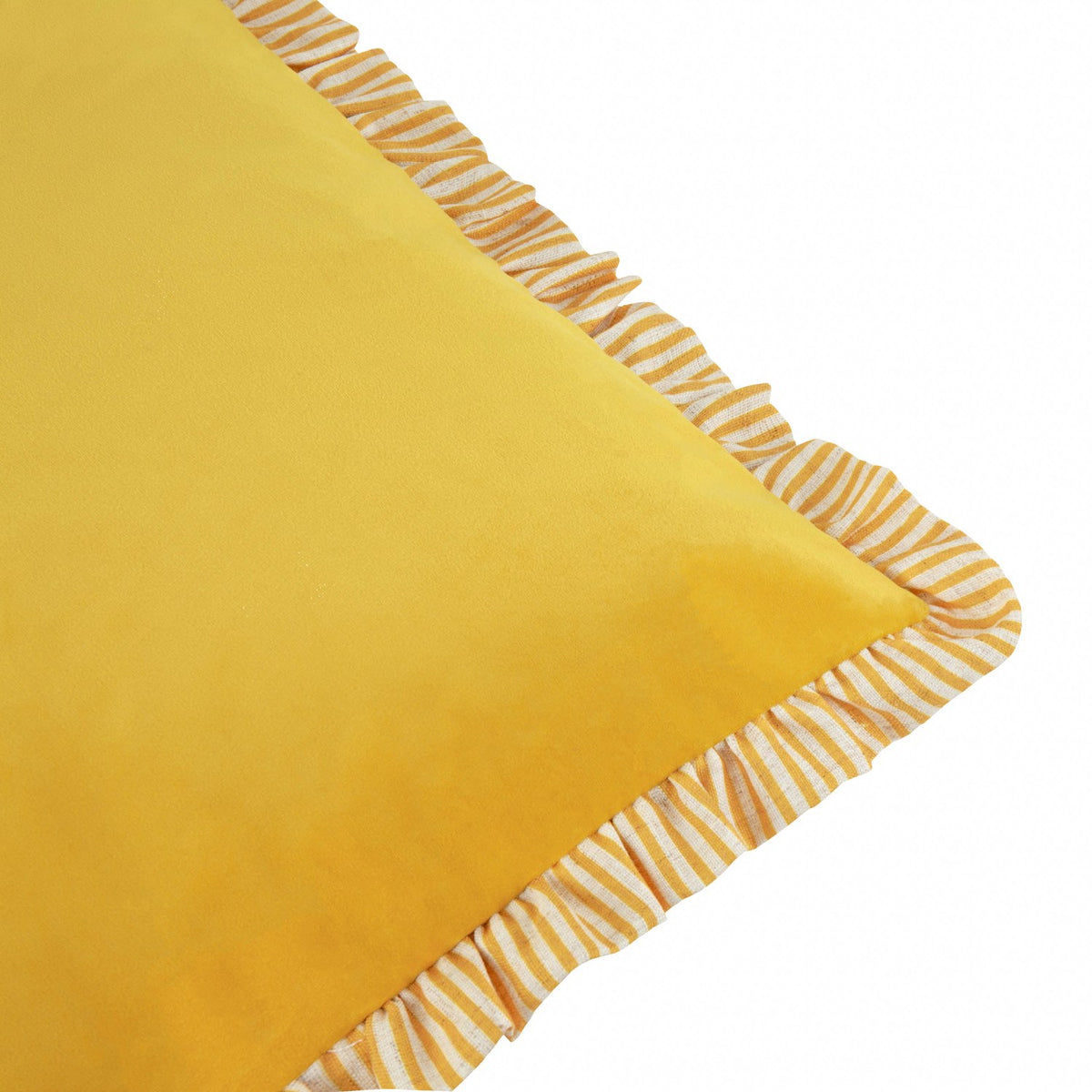 Solene Ruffle Velvet Linen Cushion in yellow, close-up of matt velvet corner edged with a cream and ochre striped ruffle trim, on a plain white background.