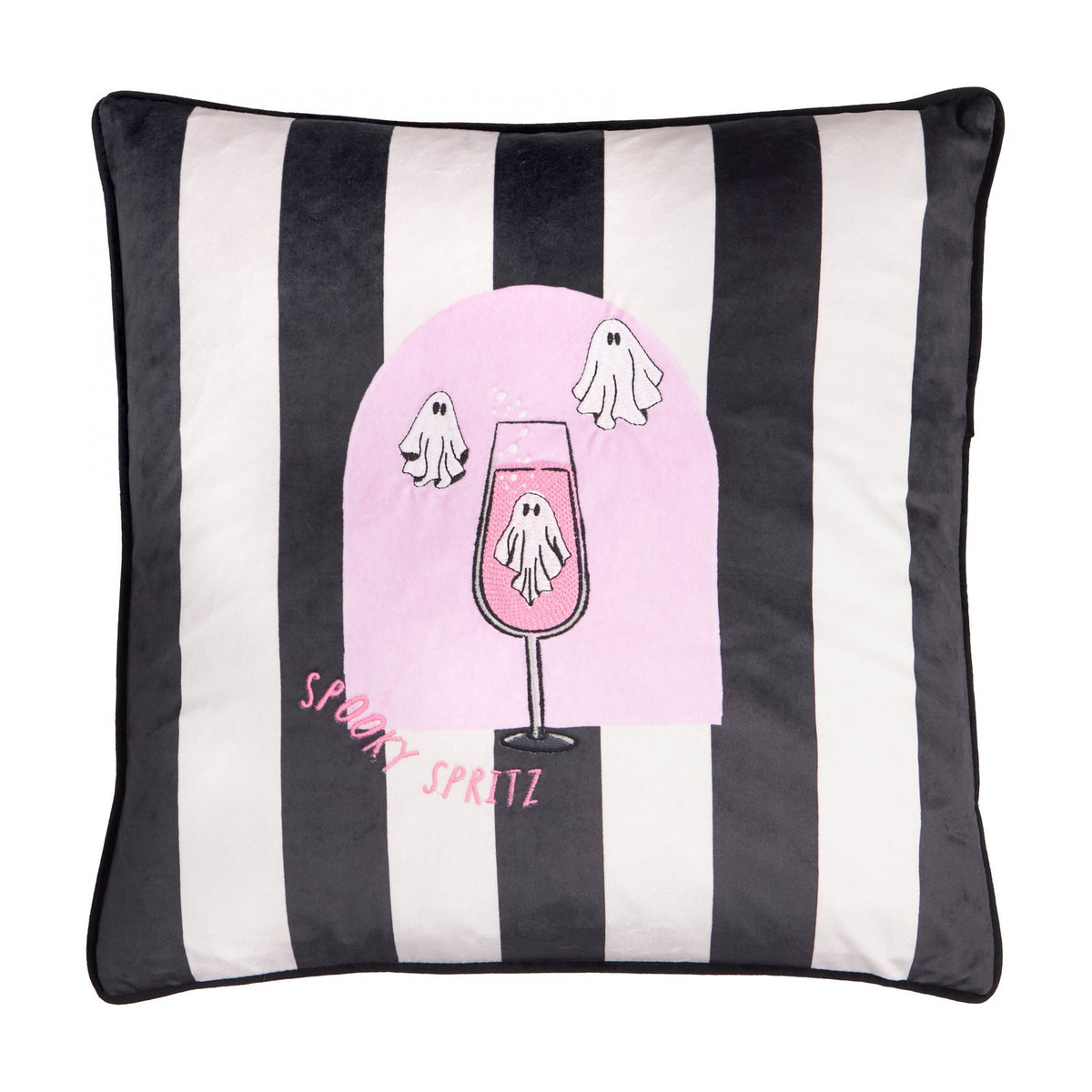 Spooky Spritz Striped Velvet Cushion in pink and mono, featuring black and white stripes, a pink arch with a ghost in a cocktail glass, and embroidered text, on a plain background.