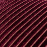 Close-up of the Savoy Stripe cushion in burgundy velvet, showing ribbed diagonal stripes with fine gold metallic threads between raised pile channels.