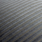 Close-up of the Savoy Stripe cushion in charcoal grey polyester velvet, showing cut-pile diagonal stripes with fine gold metallic threads running through the flatter channels.