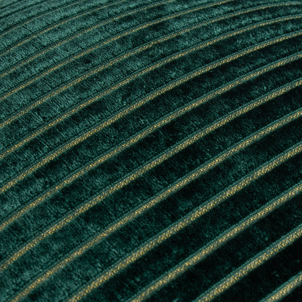 Close-up of the Savoy Stripe cushion in emerald green, showing cut velvet ridges with a subtle gold-green shimmer along the raised stripes.