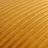Close-up of the Savoy Stripe cushion in gold polyester velvet, showing raised cut-velvet ribs with recessed channels catching the light diagonally.