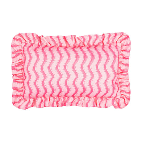 Rectangular outdoor cushion in hot pink with a wavy vertical stripe print and a gathered ruffle trim on all four sides, shown on a plain white background.