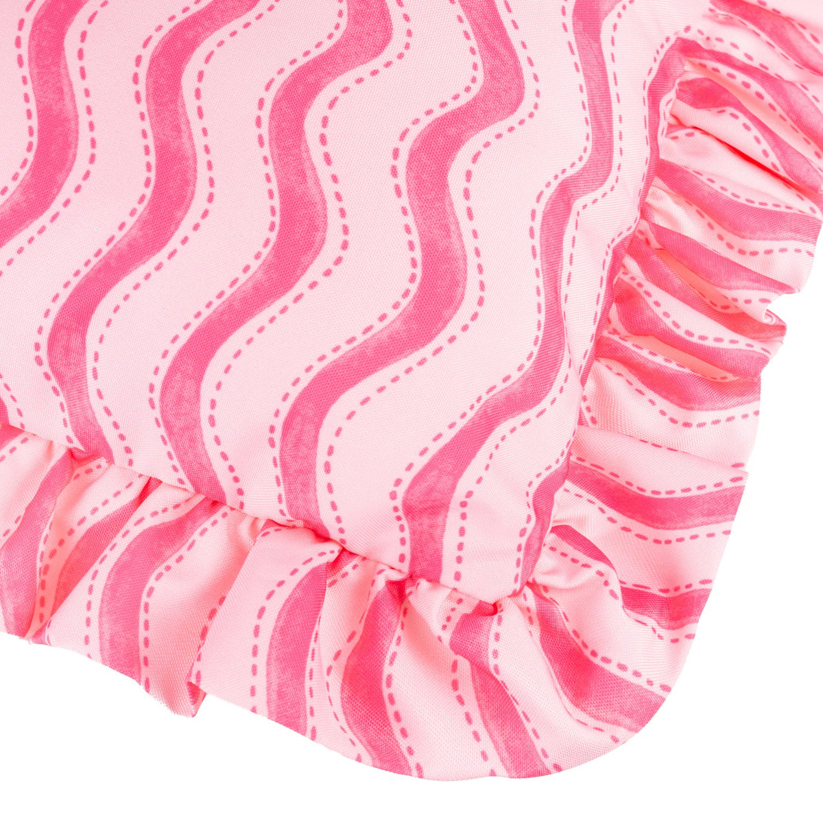 Close-up of the Summer Solstice Wiggly Stripe polyester cushion in hot pink, showing wavy vertical stripes with dotted stitch detail and a gathered ruffle trim edge.