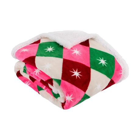 Folded Star Sherpa throw in a green, red, pink and cream diamond print with white star motifs on the fleece side, backed with plain cream sherpa, shown on a white background.