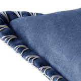 Close-up of the Stitch Plain Velvet Cushion in bluebell blue, showing the soft velvet surface and hand-worked ecru blanket stitch edging on a white background.