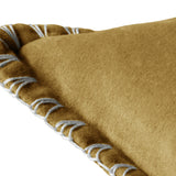 Close-up of the Stitch Plain Velvet Cushion in mustard yellow, showing smooth velvet fabric and a contrast pale blanket stitch trim along the edge.