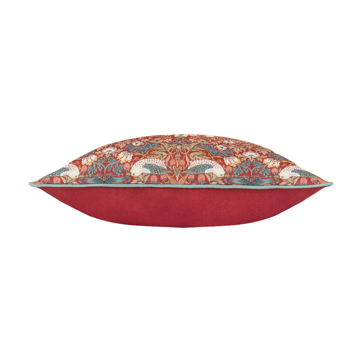 Side view of the Strawberry Thief Floral Polyester Cushion in berry red, showing plain red piped edge and patterned top with birds and foliage, set on a white background.