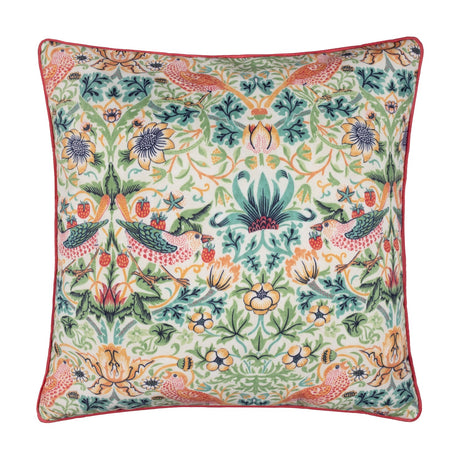 Square Strawberry Thief cushion, 50x50cm, with coral piped edge, printed with birds, strawberries and foliage in coral, leaf green, teal and amber on a pale ground, shown on a white background.