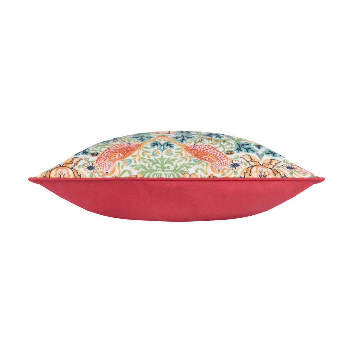 Side view of the Strawberry Thief Floral Polyester Cushion, showing the coral piped edge, plain coral reverse, and patterned front with birds, strawberries and foliage on a pale ground.