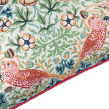 Strawberry Thief Floral Polyester Cushion corner detail, showing coral birds among strawberries and foliage on a pale ground with a coral piped edge trim.