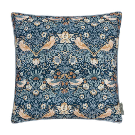 Square 50x50cm Strawberry Thief Floral Polyester Cushion in indigo, with birds, strawberries and floral motifs in amber and cream, pale piped edge trim, on a white background.