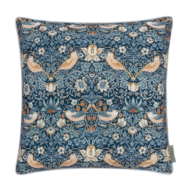 Square 50x50cm Strawberry Thief Floral Polyester Cushion in indigo, with birds, strawberries and floral motifs in amber and cream, pale piped edge trim, on a white background.