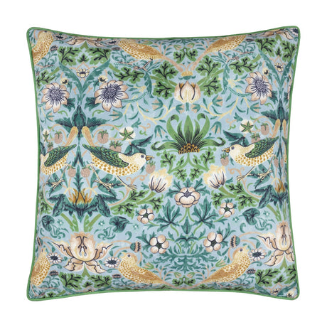 Square Strawberry Thief cushion in mineral-blue with yellow birds, cream flowers and green foliage print, finished with green piping, shown on a white background.