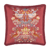 Square Berry velvet cushion featuring mirrored bird and strawberry foliage embroidery in gold, coral and grey on deep red, with matching fringe trim.