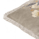 Strawberry Thief Jacquard Velvet Cushion in biscuit-beige, corner view showing fringed edging and embroidered bird and foliage detail on matt velvet, set against a plain white background.