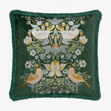 Square forest green velvet cushion with embroidered Strawberry Thief bird and floral design in cream, gold and rust, finished with matching fringe trim.