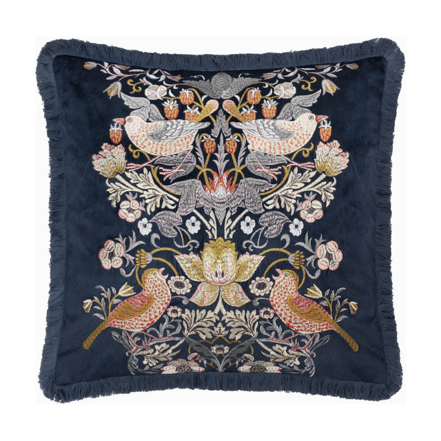 Strawberry Thief Jacquard Velvet Cushion in indigo, square with fringed edging, embroidered mirrored bird and strawberry motif with florals on deep blue velvet, shown on a white background.