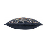 Strawberry Thief Jacquard Velvet Cushion in indigo, shown side-on with fringed edge trim, bird and floral embroidery visible along the top seam, on a plain white background.