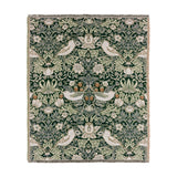Strawberry Thief Jacquard Cotton Throw in Forest Green, a woven William Morris design of birds, strawberries and foliage with fringed edges, shown on a plain white background.