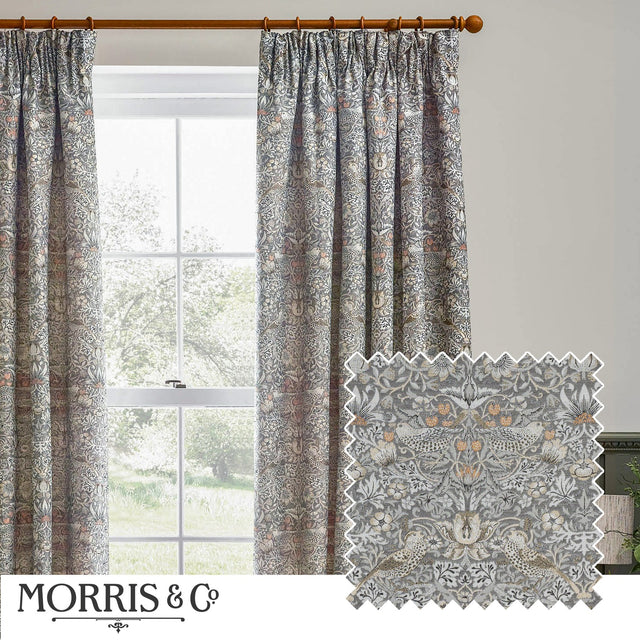 Pencil pleat curtains in Strawberry Thief jacquard pattern, grey and biscuit tones with bird and floral motifs, shown pleated on a wooden pole beside a window, with fabric swatch detail inset.