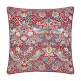 Square jacquard velvet cushion in Strawberry Thief pattern, deep berry red ground with slate blue and cream birds, tulips and foliage, shown on a white background.