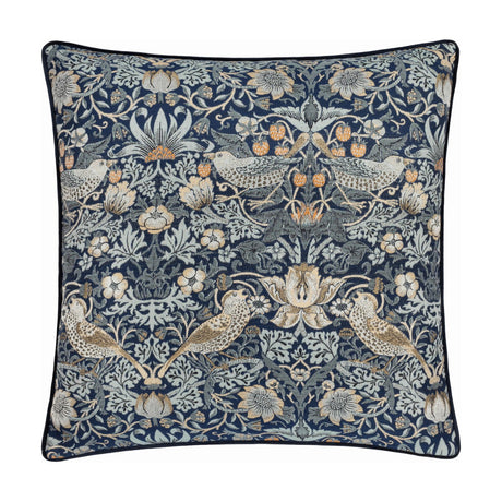 Strawberry Thief Jacquard Velvet Cushion in indigo, square with navy piping, showing birds, strawberries and scrolling foliage woven in blue, grey and gold tones on a plain background.