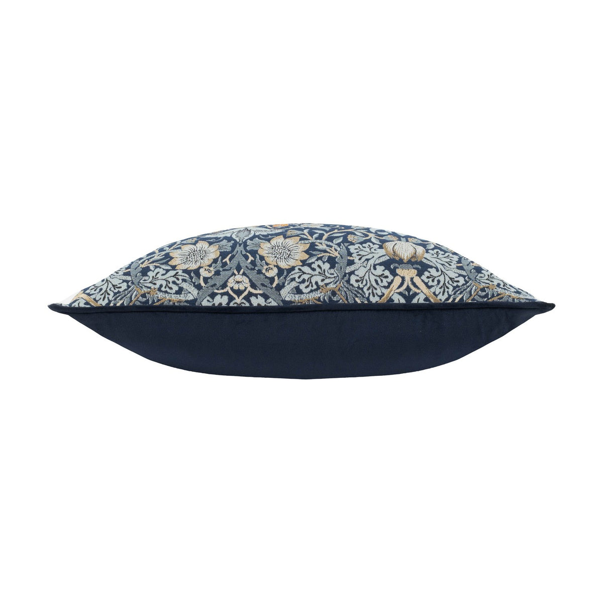 Side view of the Strawberry Thief Jacquard Velvet Cushion in indigo, showing the patterned front edge and plain navy velvet back and sides on a white background.