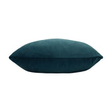 Sunningdale plain velvet cushion in kingfisher teal, shown side-on with plump piped edges, dense pile finish, on a plain white background.