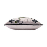 Side view of the Tropica Cheetah Animal Velvet Cushion in blush pink velvet, showing black piped edging and botanical foliage design along the top edge, on a plain white background.
