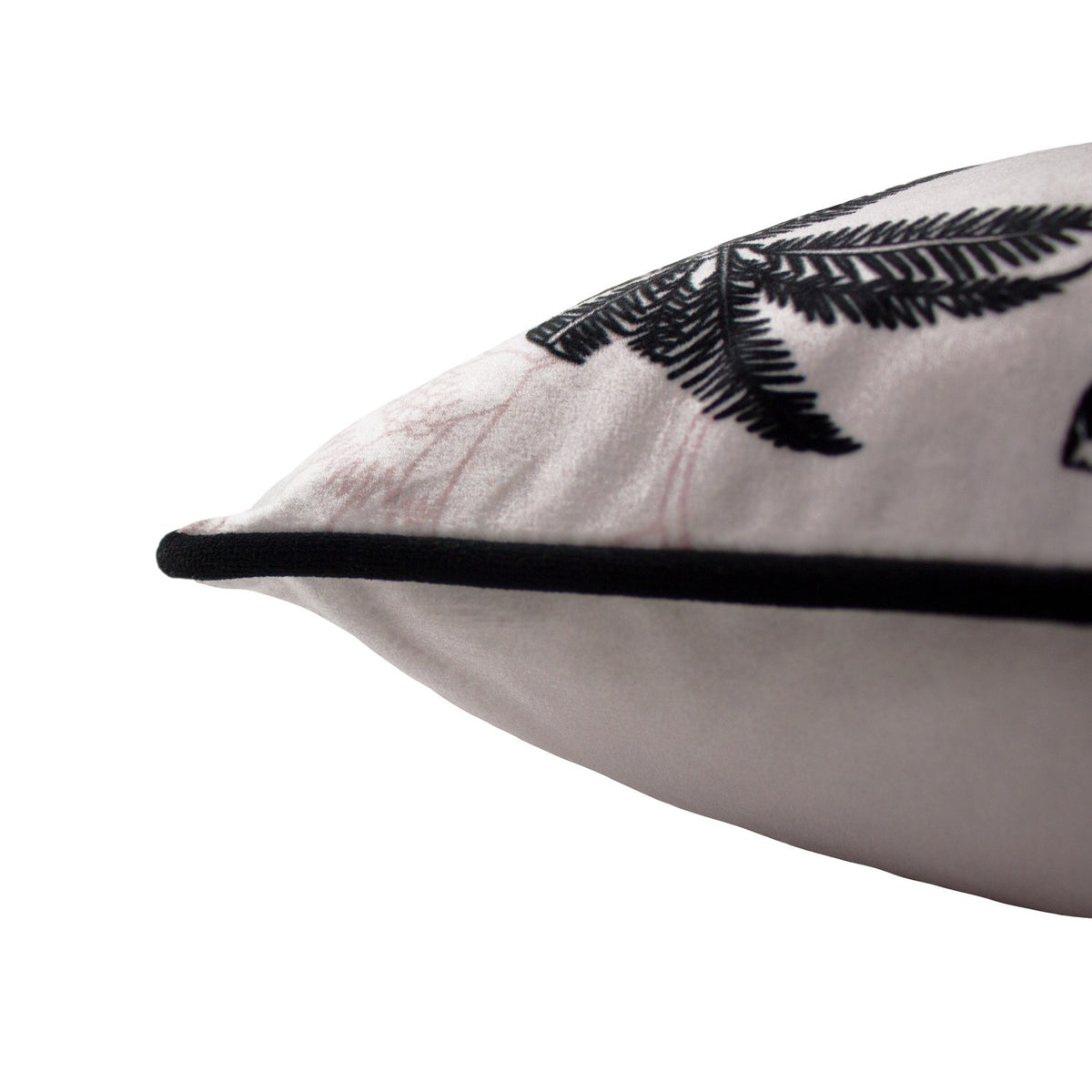 Corner view of the Tropica Cheetah Animal Velvet Cushion in blush, showing black piped edging and velvet fabric against a plain white background.