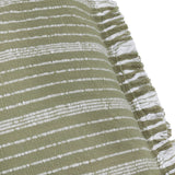 Close-up of the Tide Striped Cotton Cushion in moss green, showing woven textured stripes in white and green cotton with a fringed ruffle trim along the edge.