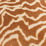 Close-up of the Tierra Abstract Velvet Cushion in bronze, showing a marbled cut-velvet pattern in warm russet brown against a paler woven ground.