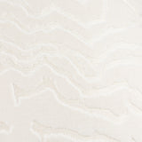 Tierra Abstract Velvet Cushion in white, close-up of raised cut-velvet ridges forming a jagged mountain-like pattern against the flatter woven ground.